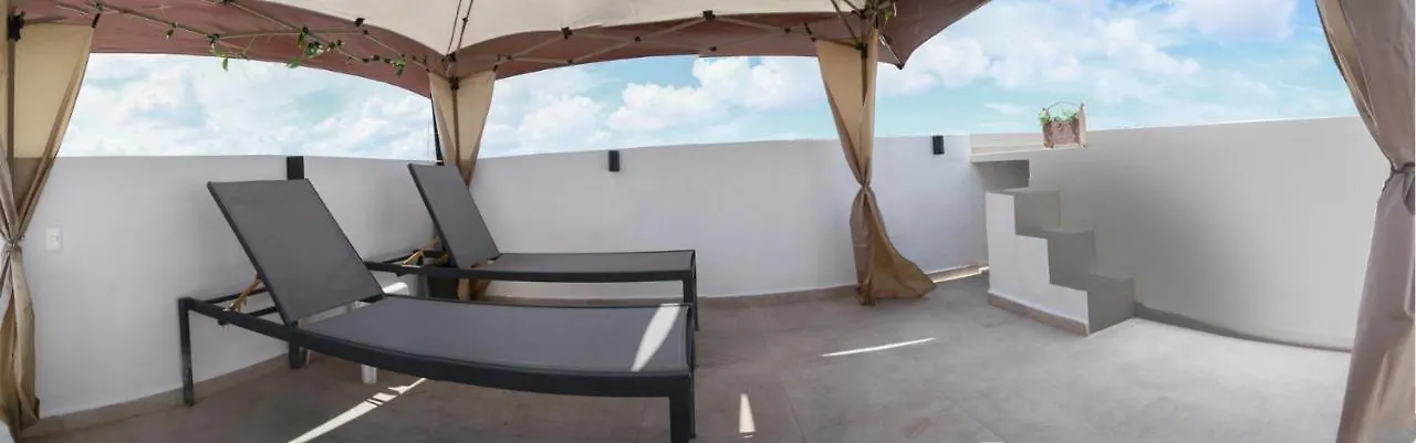 Quarto em Acomodações Particulares Habitación Privada, Jacuzzi Rooftop, AC, GRAN Wifi Cancún